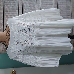 Anthropologie Deletta hi low lace top.